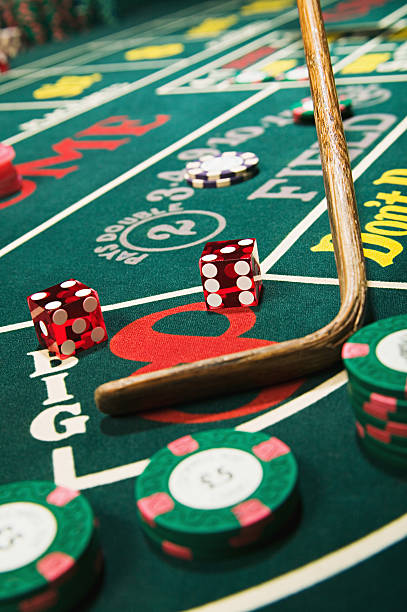 Live Sic Bo dealer table with three dice in transparent cage